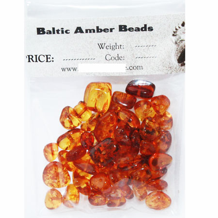 Cognac Amber roundish beads 10 gr. 