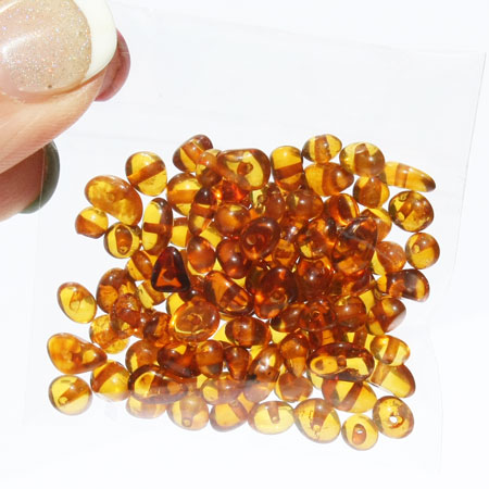 Small Cognac Amber roundish beads